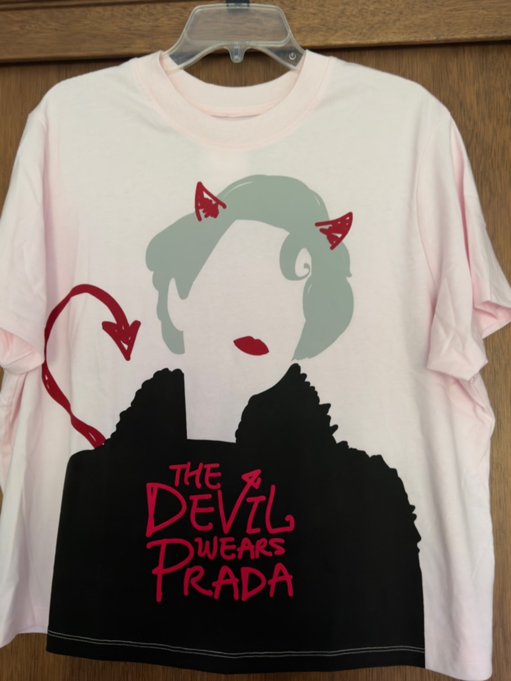 Prada Light Pink Graphic Tee with Black and Red Print